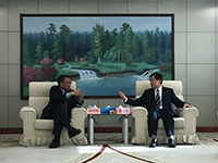 Vice-Chancellor Prof. Rocky Tuan (left) leads a visit to MCA